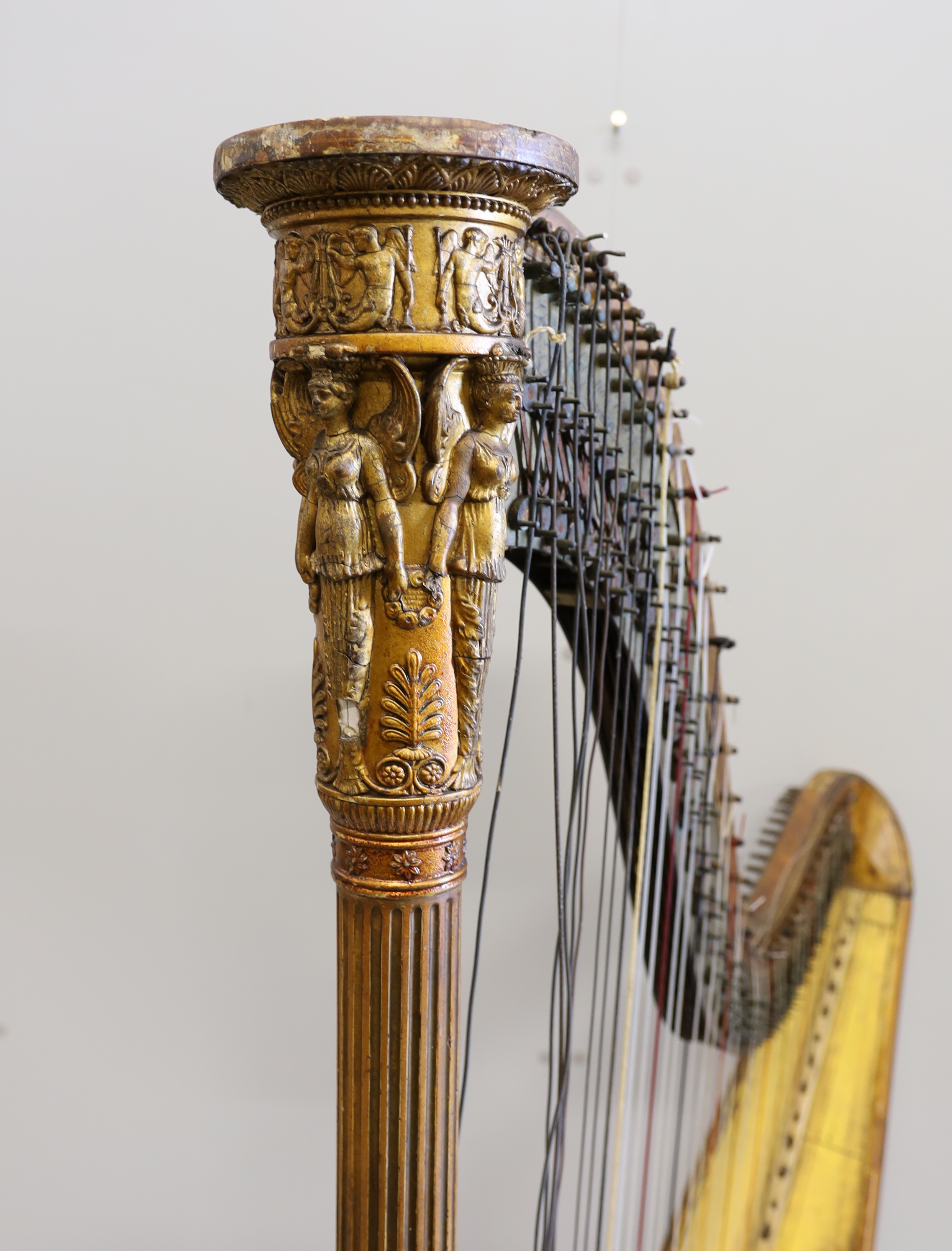 A 19th century Sebastian Erard Patent 3610 harp, in need of restoration, painted sound board, gilt fluted column and Classical capital, 170cm high